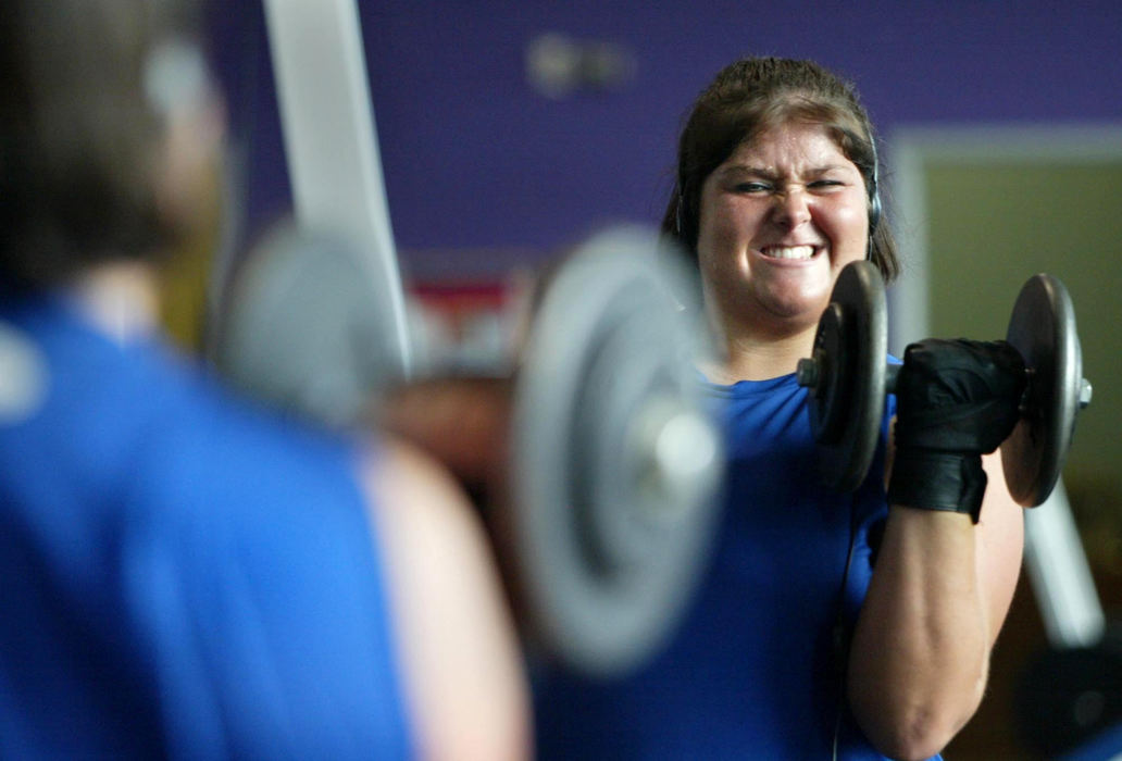 Third Place, Photographer of the Year - Fred Squillante / The Columbus DispatchTiff Wheeler, starting center for the Columbus Flames, hits the weights. She has gladly endured such workouts in pursuing her dream of playing football.