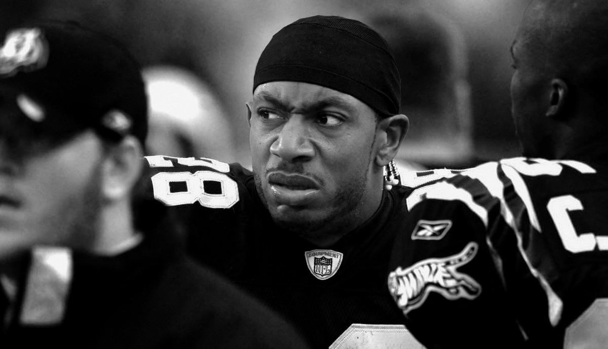 Award of Excellence, Photographer of the Year - Michael E. Keating / Cincinnati EnquirerCorey Dillon glares as he stalks the sidelines. Injured and loss of playing time prompted Dillon to often speak only with facial expression.  His displeasure is evident.