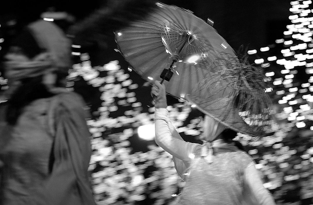 Second Place, Photographer of the Year - Greg Ruffing / FreelanceA dancer adds an artistic flare to a holiday parade as she moves past some of the more than 450,000 Christmas lights illuminating Public Square in downtown Cleveland.