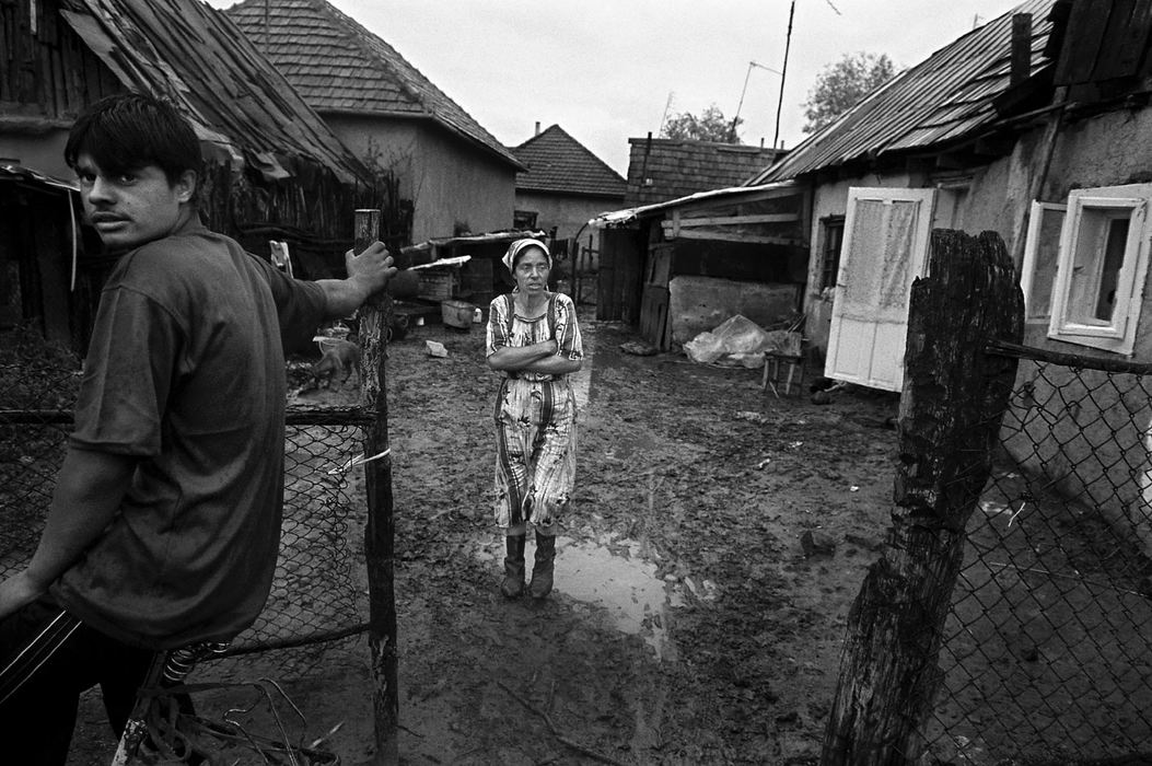 Second Place, Photographer of the Year - Greg Ruffing / FreelanceOriginating in India, the Roma people (more commonly known as gypsies) made their first mass migrations into Europe in the 14th century. While their culture is vibrant with song and dance and a free-spirited disposition, Roma history is scarred by tales of slavery, sterilization and banning of their language. A woman emerges from her house on a cold rainy day to take a walk through the village. Roma tend to be nomadic people, living in segregated settlements on the fringes of towns and cities. 