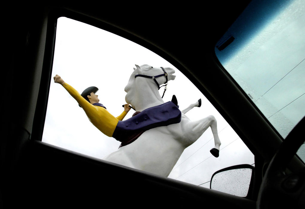 Third Place, Photographer of the Year - Fred Squillante / The Columbus DispatchCars and a horse share the same parking lot in front of Chartland Tack and Saddlery in Alexandria, Ohio.