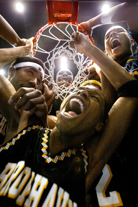 Third Place, Sports Feature - Joe Maiorana / ThisWeek NewspapersBRK's Everett Spencer (front) and teammates cut down the nets as they celebrate their hard-fought road through the regionals with wins over Newark and Lancaster on at the Fairgrounds Coliseum.