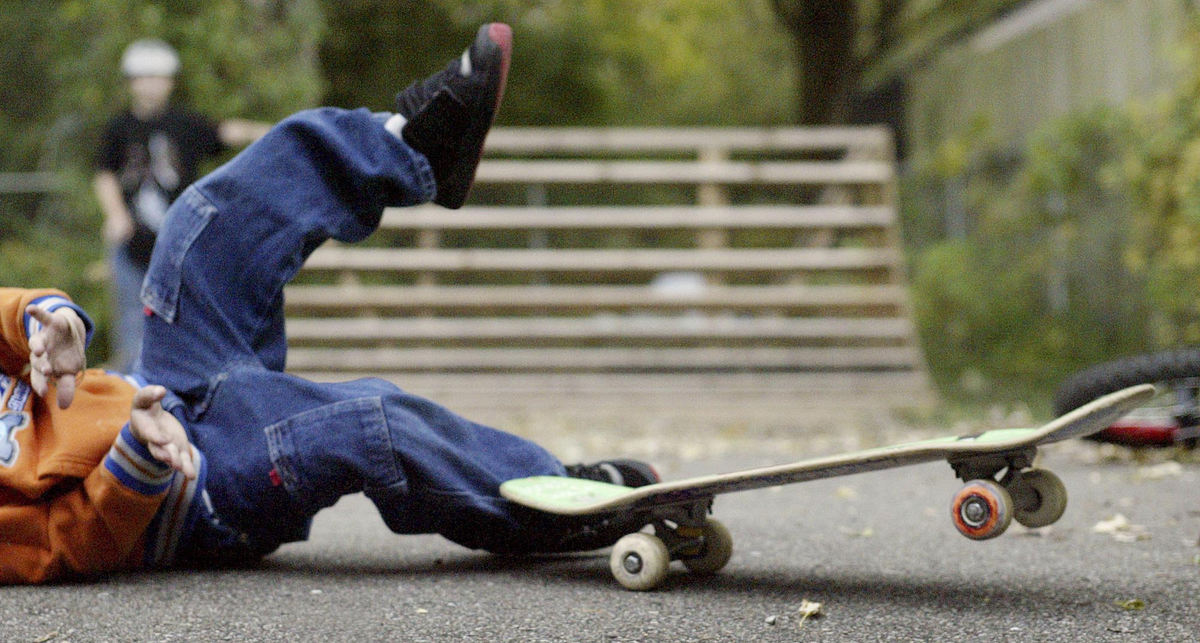 Second Place, Student Photographer of the Year - Scott R. Galvin / Kent State UniversityAs with any sport, athletes take their fair share of falls and spills, nothing is more true with Dylan, who gets back on his board as quickly as he falls. Since it is near impossible to always go to the skate park, Dylan practices on the pavement in the backyard, where he has an assortment of ramps and rails to grind on.