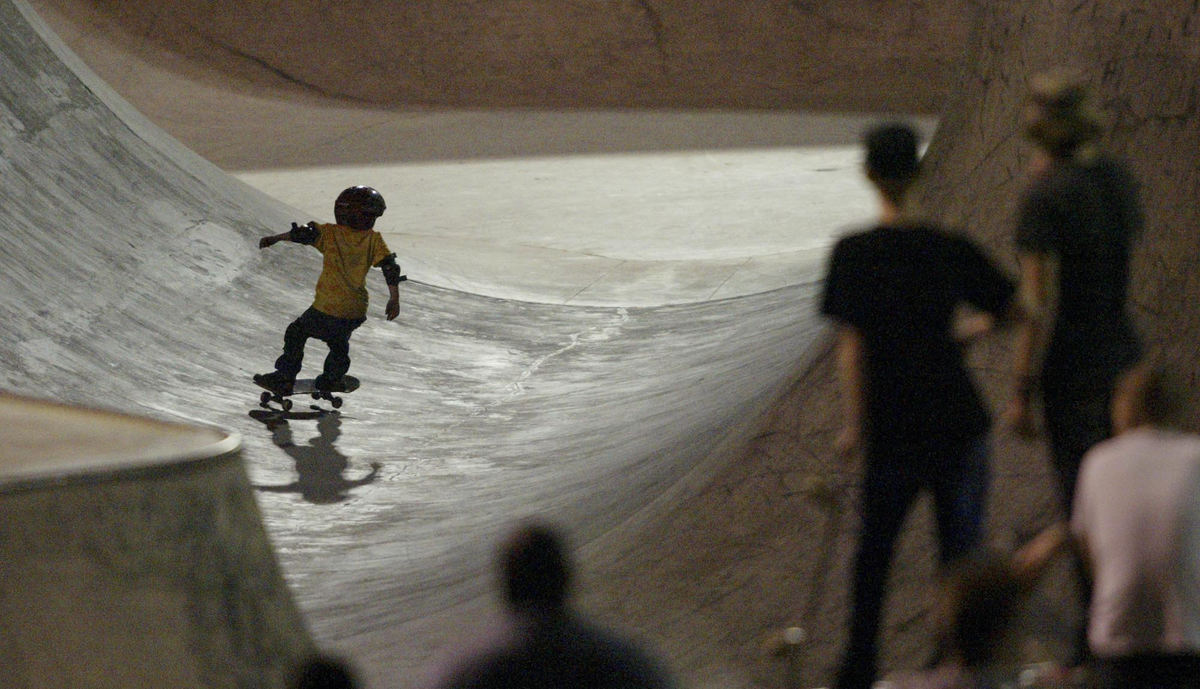 Second Place, Student Photographer of the Year - Scott R. Galvin / Kent State UniversitySkaters take a break to watch Dylan manuever through the thirty-foot pipe and around the walls of the Extreme Park.