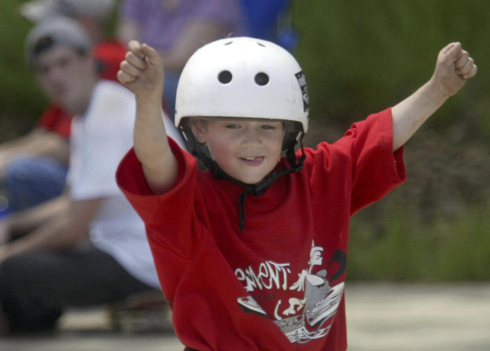 Second Place, Student Photographer of the Year - Scott R. Galvin / Kent State UniversityDylan celebrates completing his first ever competition in his skateboarding career on May 10, 2003, at the Radcliffe Skate Park.  Following the competition, he was offered a sponsorship by skateboard deck manufacturer Nice Skateboards, based out of California.