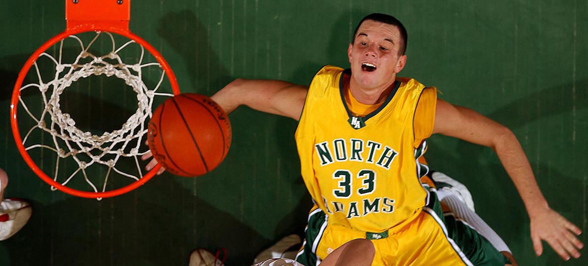 Third Place, Student Photographer of the Year - Robert Caplin / Ohio UniversityNorth Adam's basketball player, Nick Howard, attempts to draw a foul during regional tournaments in Athens.