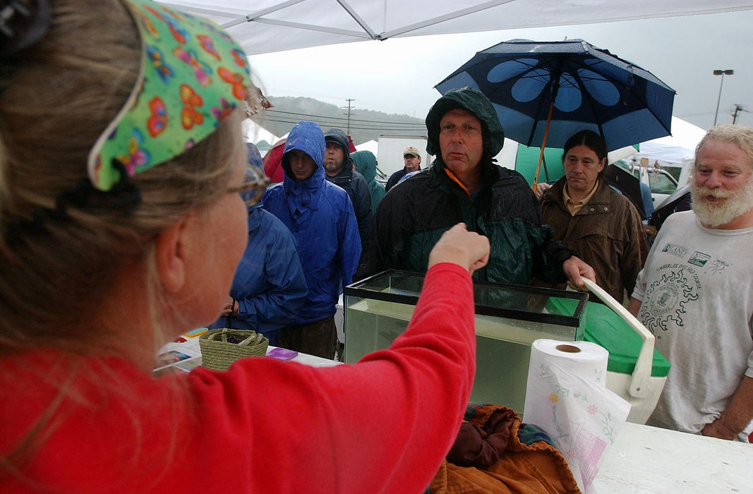 Third Place, Student Photographer of the Year - Robert Caplin / Ohio UniversityPolly Creech sells her catch at the Athens County Farmer's Market in Athens. Some buyers were willing to pay $17.00 a pound for the local shrimp.