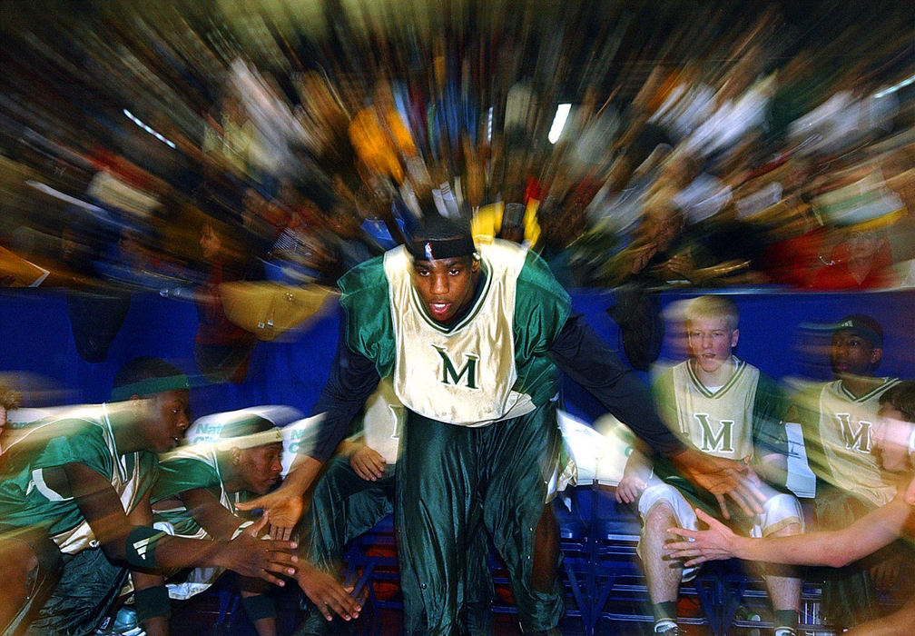 Second Place, Sports Picture Story - Phil Masturzo / Akron Beacon JournalSt. Vincent-St. Mary senior LeBron James makes a flashy entrance to his senior season that was surrounded by a whirlwind of nation media attention. 