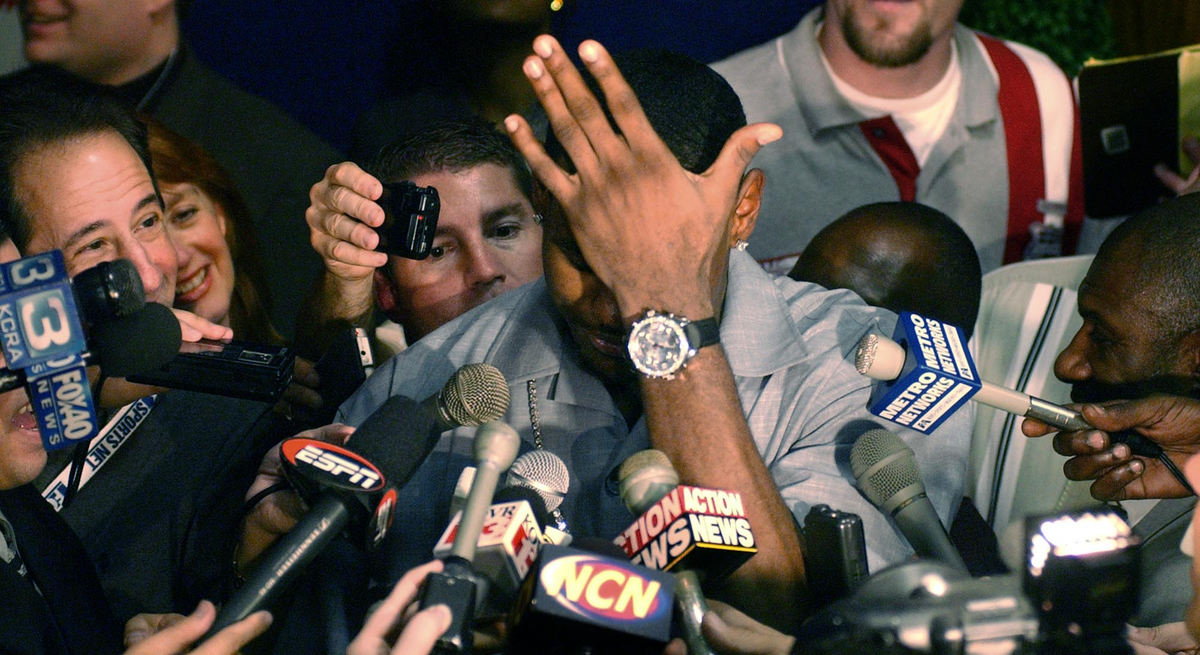 Second Place, Sports Picture Story - Phil Masturzo / Akron Beacon JournalLeBron James succumbs to the media attention in a press conference following his first professional game. 