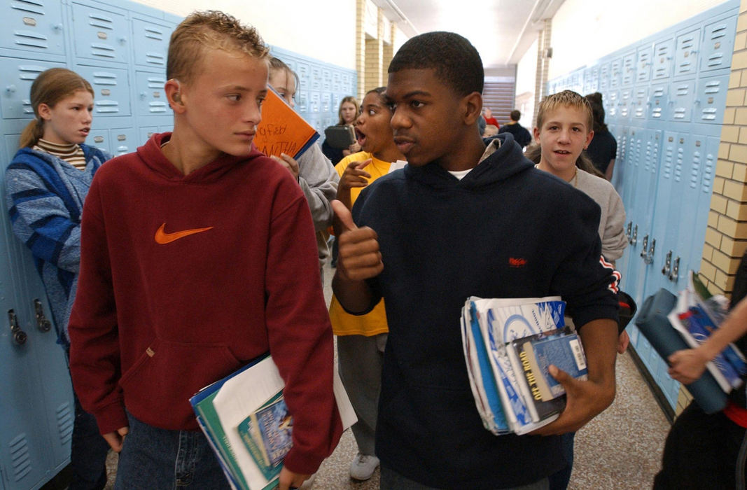 Third Place, Sports Picture Story - David Distelhorst / Akron Beacon JournalSandro, left, and Terrel walk down the hallway to class. 