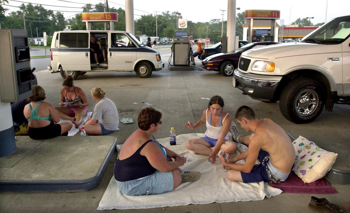 Second Place, Team Picture Story - Dale Omori / The Plain DealerVisitors to Cedar Point Amusement Park, some from as far away as Illinois and Michigan, found themselves stranded at a the gas station near the park.  Gas pumps were inoperable, stranding travelers who were low on fuel.  