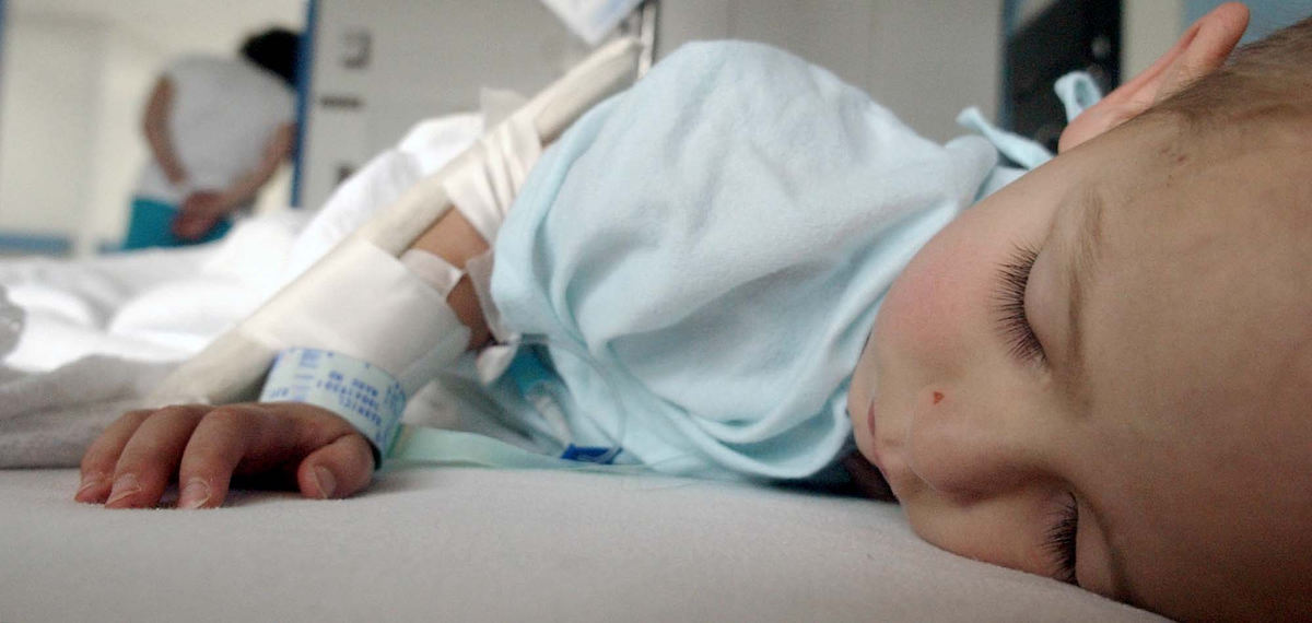 Award of Excellence, Team Picture Story - Daniel Melograna / The News JournalLuke Ervin, 3, sleeps while he waits for the medical staff at Children's Hospital to come for him July 15 as his mother, Ivy, leans against the doorway to his room.