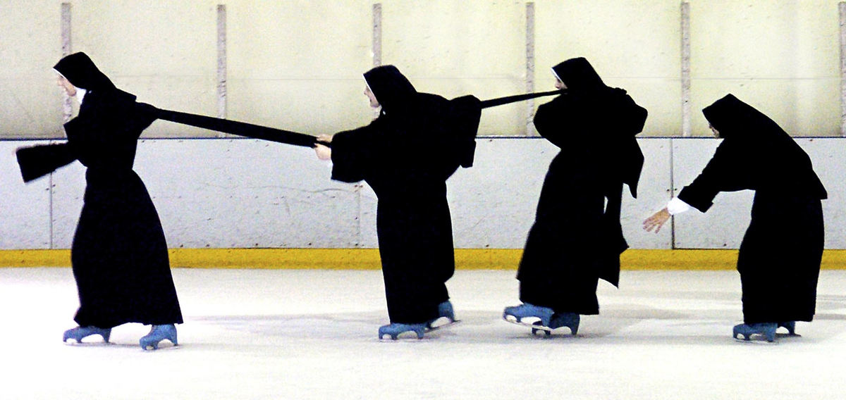 Second Place, Enterprise Feature - Sarah Conard / Cincinnati EnquirerSisters of the Norwood and Minnesota convents of the Daughters of Mary, Mother of Our Savior congregation ice skate at the Northern Kentucky Ice Center in Crescent Springs on November 26, 2004. The Minnesota congregation was visiting for the Thanksgiving holiday.