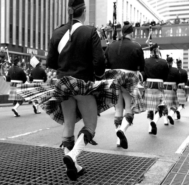 Award of Excellence, Enterprise Feature - Michael E. Keating / Cincinnati EnquirerKilted bagpipers answer the age old question about what they wear under their kilts as air from a grate blows upward during a St. Patrick's Day Parade. 