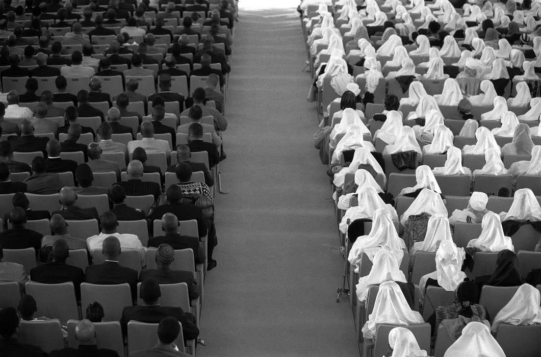 Award of Excellence, Feature Picture Story - Eustacio Humphrey / The Plain DealerThousands of members and guests attend a Sunday afternoon meeting at Mosque Maryam headquarters of the Nation of Islam in Chicago, to listen to Minister Louis Farrakhan. At the mosque, male and female sit on different sides of the aisle.