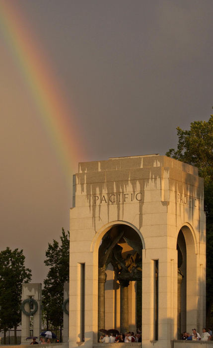 First Place, News Picture Story - Joshua Gunter / The Plain DealerAfter a short rain, the sun cast its rays over the World War II Memorial, creating a rainbow that spanned the length of the memorial, with one end landing on the Pacific Arch, May 28, 2004 in Washington D.C.  
