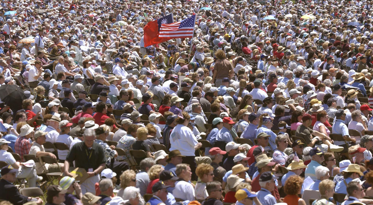 First Place, News Picture Story - Joshua Gunter / The Plain DealerThousands apon thousands of veterans, supporters, and spectators crowded the lawn near the Washington Monument to view the dedication of the World War II Memorial, May 29, 2004 in Washington D.C.  
