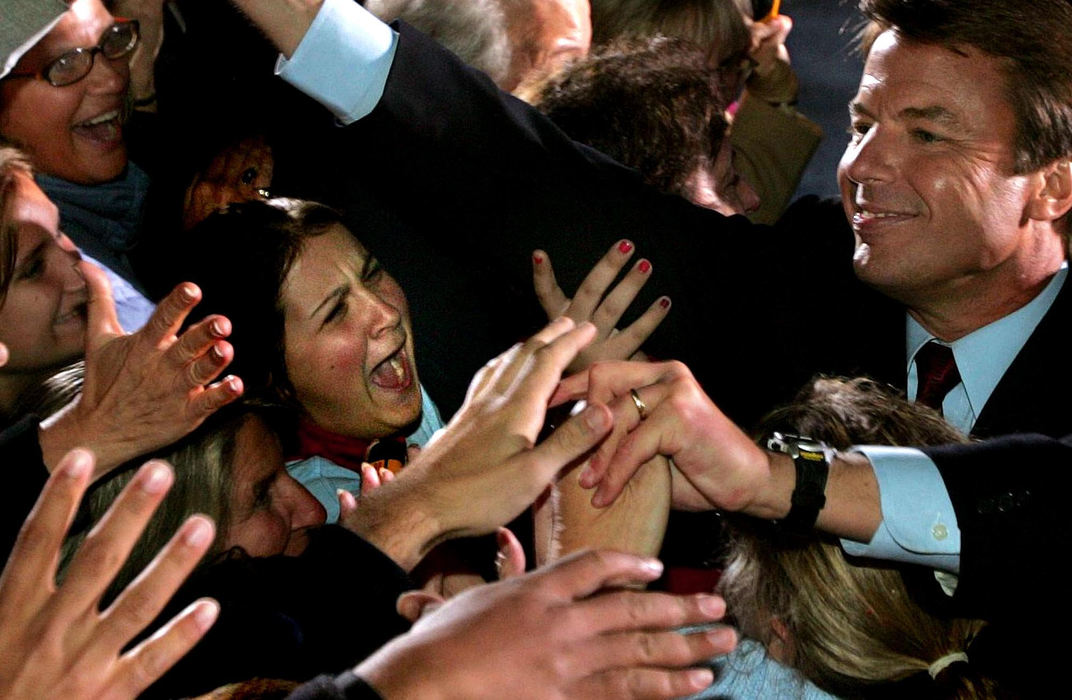 Third Place, Photographer of the Year - Joshua Gunter / The Plain DealerSupporters fight for a chance to shake the hand of Senator John Edwards at a rally in University Circle following the vice presidential debates at Case Western Reserve University, October 05, 2004 in Cleveland.   