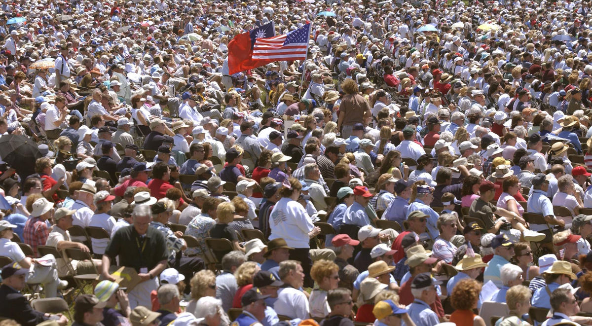 Third Place, Photographer of the Year - Joshua Gunter / The Plain DealerThousands upon thousands of veterans, supporters, and spectators crowded the lawn near the Washington Monument to view the dedication of the World War II Memorial, May 29, 2004 in Washington D.C.  