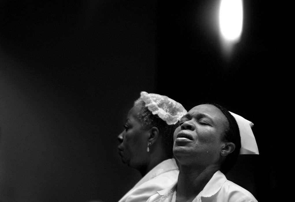 Second Place, Photographer of the Year - Mike Levy / The Plain DealerThis set of photographs addresses the varied roles of African American faith communities found in Cleveland's inner city.  This African American community is still able to create music that evokes the highest level of joy, even after all of its travail.  Tears of relief shed during worship at Cleveland Church of Christ.  
