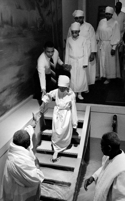 Second Place, Photographer of the Year - Mike Levy / The Plain DealerYoung girl is Baptized on Easter Sunday at Olivet Institutional Baptist Church.