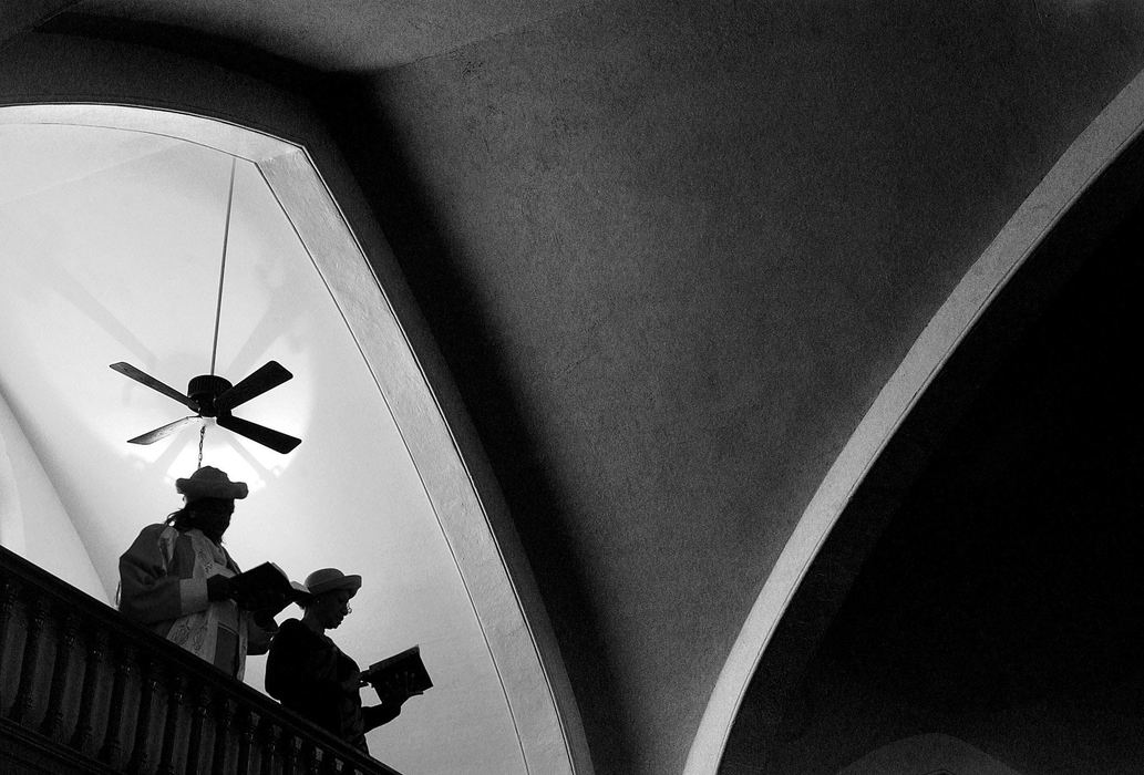 Second Place, Photographer of the Year - Mike Levy / The Plain DealerWomen with hats in balcony at historic St. Paul A.M.E. Zion Church.