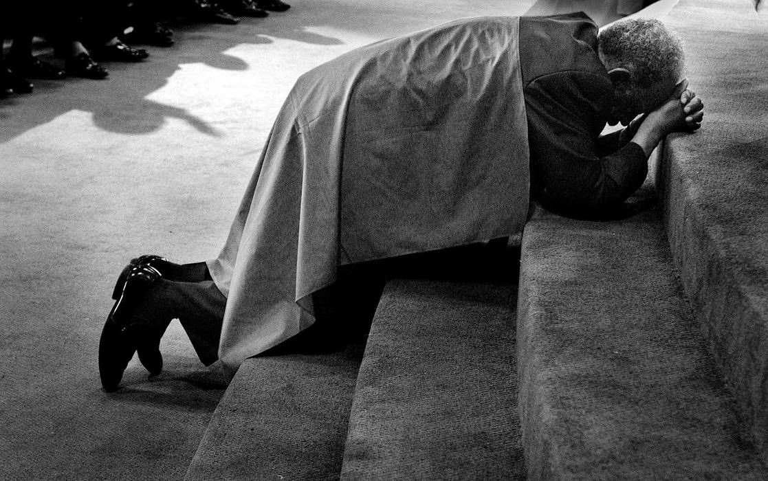 Second Place, Photographer of the Year - Mike Levy / The Plain DealerWhen people come to the alter at Mt. Sinai Baptist Church to pray they are covered with a protective blanket. 