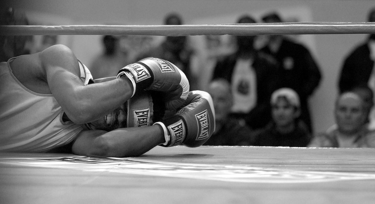 Second Place, Photographer of the Year - Mike Levy / The Plain DealerUnfortunatly for McPherson in his first match in the first round of the trials he was pushed down by his opponent causing him a neck injury.