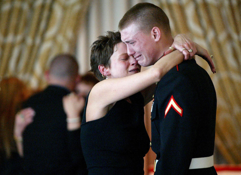 Award of Excellence, Photographer of the Year - Fred Squillante / The Columbus DispatchChantil Vandayburg comforts her son Chris, who is serving in the Marines, at the funeral of his brother, Army Spc. Allen "A.J." Vandayburg. Allen Vandayburg was killed when his Bradley Fighting Vehicle was struck by a rocket-propelled grenade in Barez, Iraq.