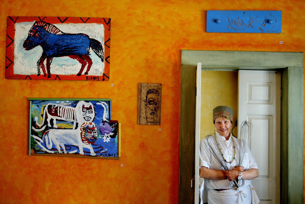 Award of Excellence, Photographer of the Year - Fred Squillante / The Columbus DispatchAlana Shock, chef-owner of Alana's Food and Wine in Columbus, Ohio, works with about 30 growers to make sure the ingredients for her soups - and other dishes - are exactly what she wants. She is posing in the dining room of her restaurant.