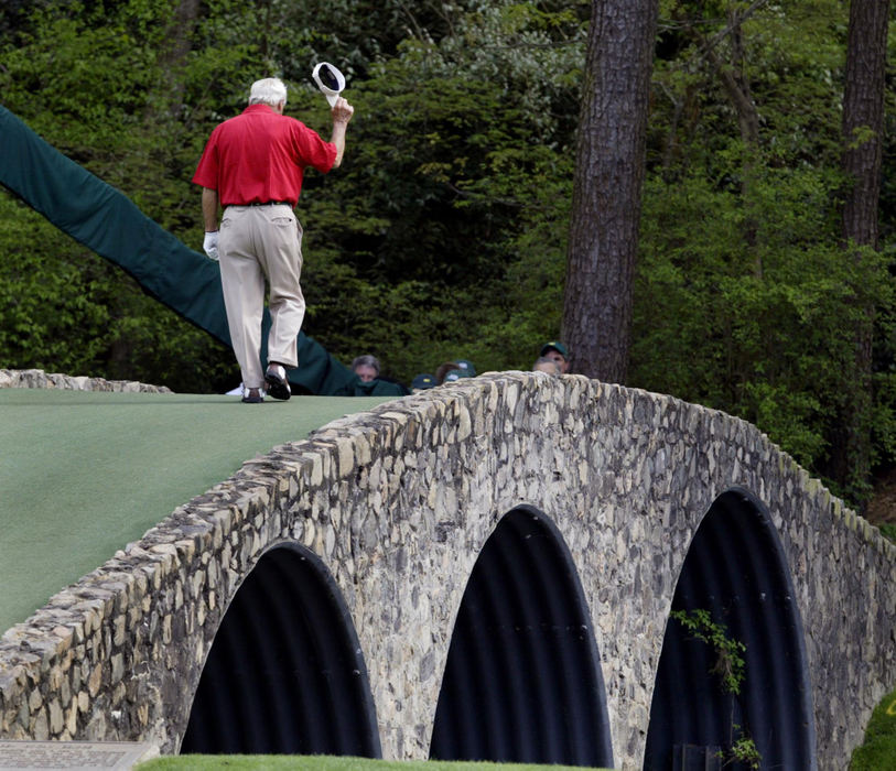 Third Place, Sports Feature - Amy Sancetta / Associated PressArnold Palmer walks across the Hogan Bridge on the 12th fairway for the final time in Masters competition during the second round of the Masters golf tournament at the Augusta National Golf Club in Augusta, Ga., April 9, 2004. 