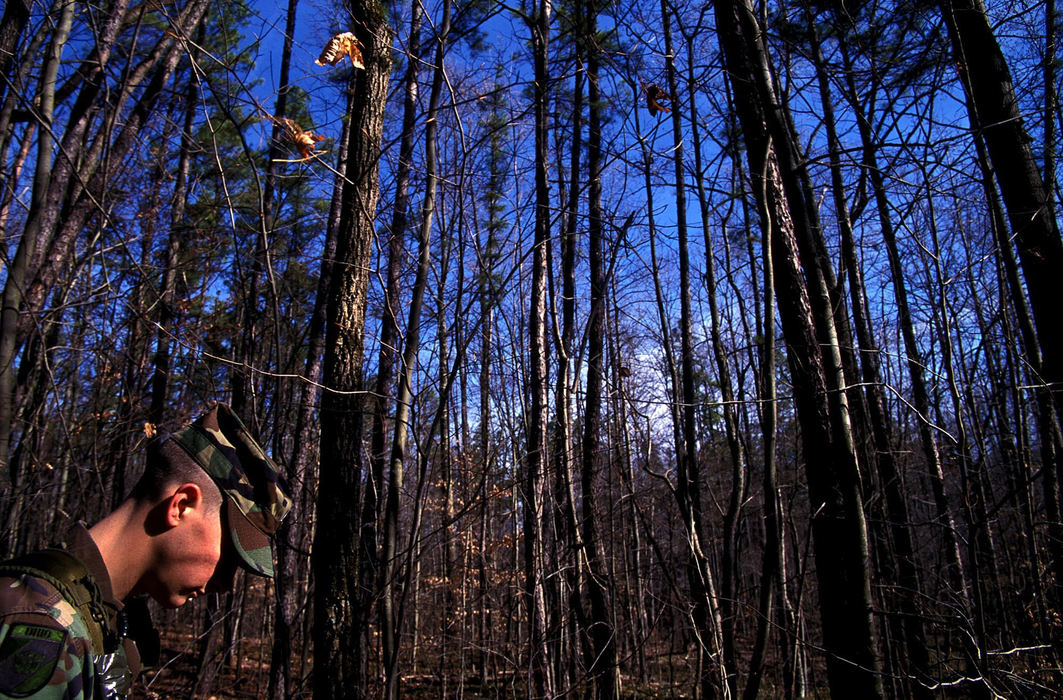 First Place, Student Photographer of the Year - Samantha Reinders / Ohio UniversityAn Ohio University ROTC member completes quarterly training, Wayne National Forest, Feburary 2004