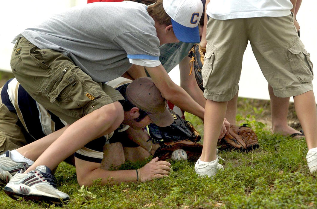 Third Place, Sports Picture Story - Chuck Crow / The Plain DealerSometimes the American Pastime can be more like a rugby game, as a scrum develops, only one winner gets the ball and sometimes the penalty of bumps and bruises comes with the ball, a prize coveted by all.  