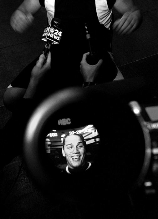 Award of Excellence, Sports Picture Story - Andy Morrison / The BladeVargas is seen through the viewfinder of a television camera as he gives interviews after a training session. Dealing with celebrity status is easy for the outgoing boxer. 