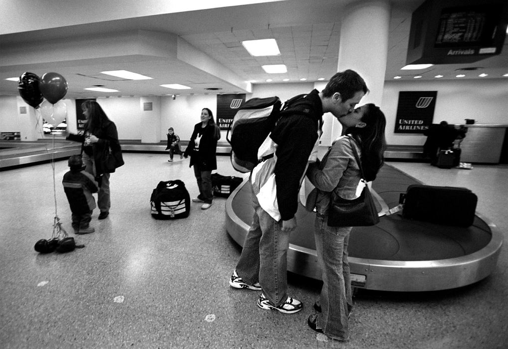 Award of Excellence, Sports Picture Story - Andy Morrison / The BladeAt the airport, Vargas gives his girlfriend Megan a kiss after returning from a tournament in Mexico.