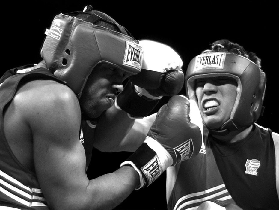 Award of Excellence, Sports Picture Story - Andy Morrison / The BladeVargas lands a right to the head of Chazz Witherspoon during the United States Olympic team box-offs in Cleveland. 