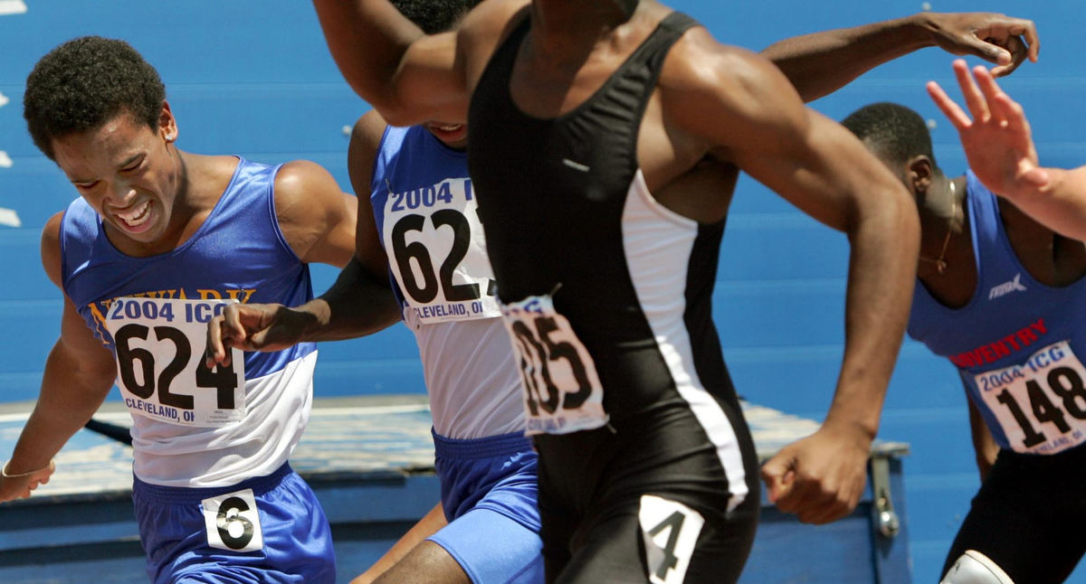 Second Place, Team Picture Story - Chuck Crow / The Plain DealerAthletes approach  the finish line in the 100-meter dash at John Carroll University's Don Shula Stadium.  Royal Okorie of Montreal, Canada, No. 105, won the event, beating out William Braswell, No. 624, of Newark, N.J.    