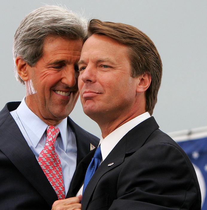 Third Place, Team Picture Story - Mike Levy / The Plain DealerKerry and John Edwards celebrate their presidential team at a campaign rally on Mall C in Cleveland.  This stop was the first appearance of Kerry with Edwards since Kerry made his vice president selection. 