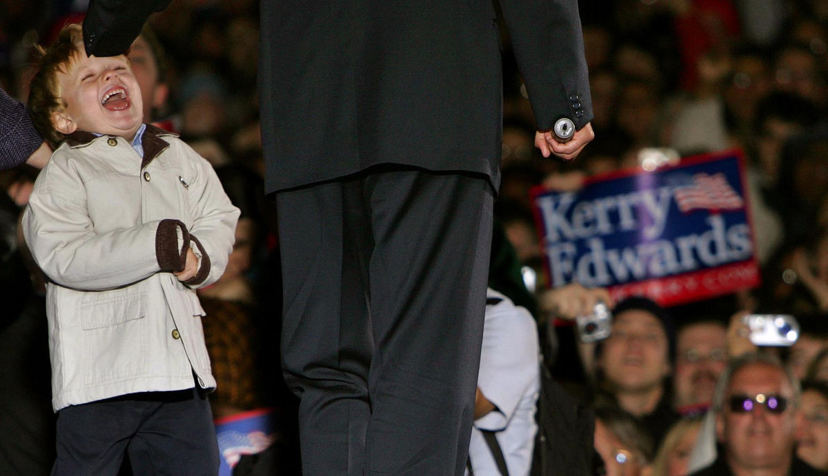 Third Place, Team Picture Story - Joshua Gunter / The Plain DealerJack Edwards, son of Sen. John Edwards, plays with his father on stage at a rally in Cleveland following the vice presidential debates at Case Western Reserve University.