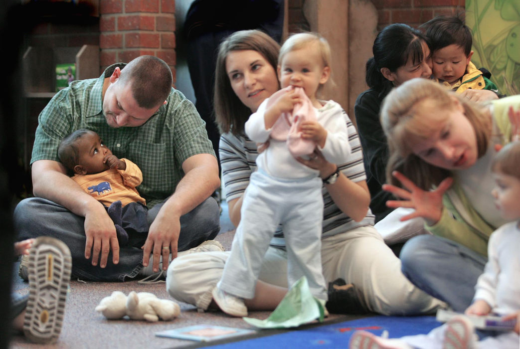 Third Place, Feature Picture Story - Chris Russell / The Columbus DispatchIn a room full of mothers and their young children, Jim and Bryce spend some time together during a Columbus Public Library story time for toddlers. 