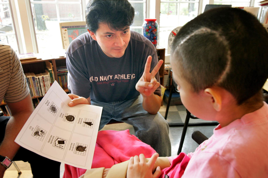 Award of Excellence, Feature Picture Story - David I. Andersen / The Plain DealerGuido works with Heidi as she tries to regain her speech.