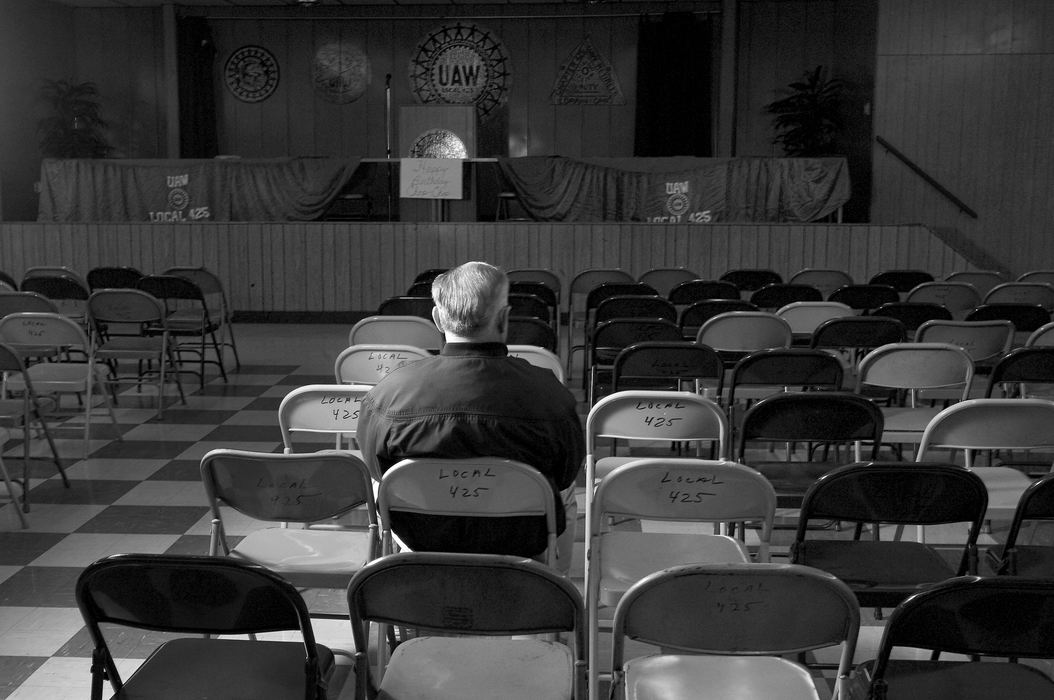 Second Place, News Picture Story - Mike Levy / The Plain DealerA retired Ford worker finds himself alone at the Union Hall before a meeting.  Because of the plant closing the fate of the Union Hall is unknown.