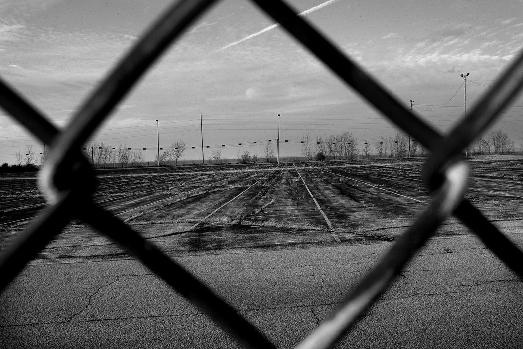 Second Place, News Picture Story - Mike Levy / The Plain DealerThis enormous parking lot was used for overflow storage for vehicles produced at Ford's Lorain Assembly Plant.  In the past this lot used to be full of Ford Econoline trucks. 