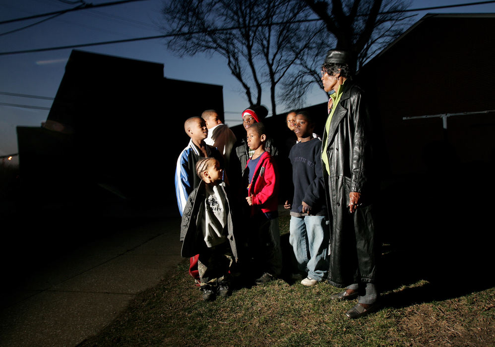 Third Place, News Picture Story - Mike Levy / The Plain DealerDeloris Walton a long time resident of Outhwaite has made it her mission to counsel young children in her neighborhood about the dangers of gangs.