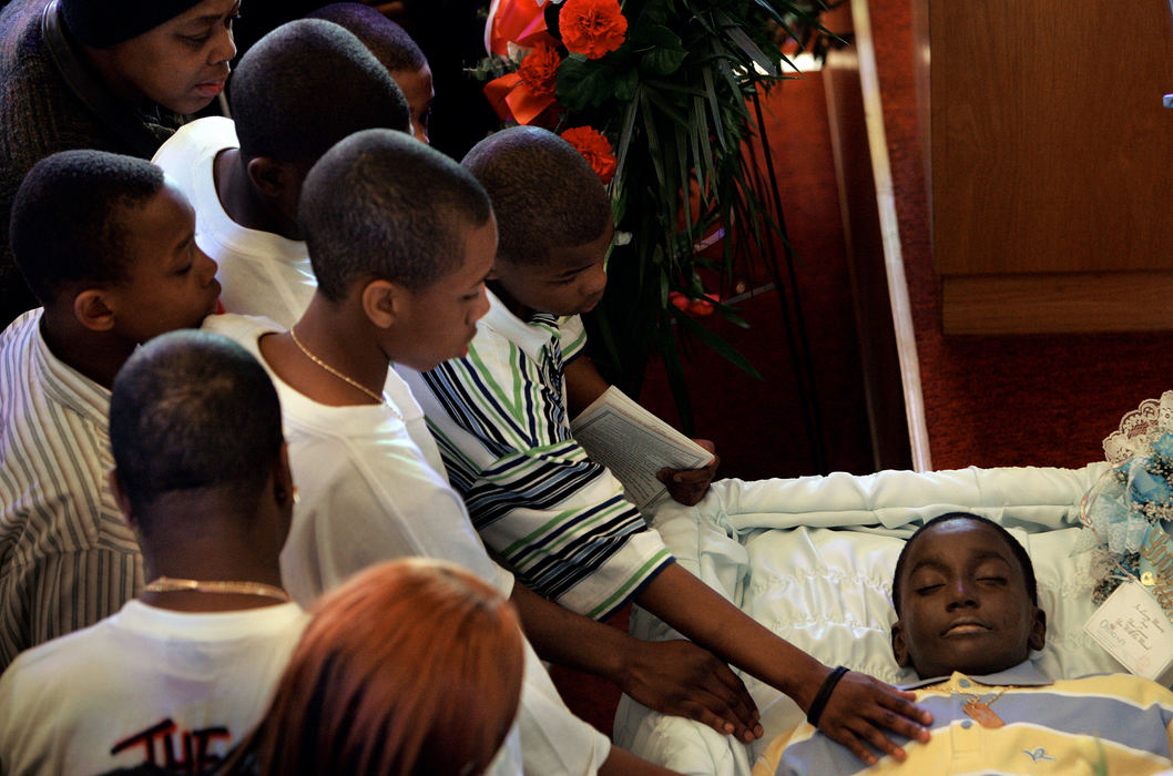 Third Place, News Picture Story - Mike Levy / The Plain DealerFriends of Brandon Davis say goodbye.