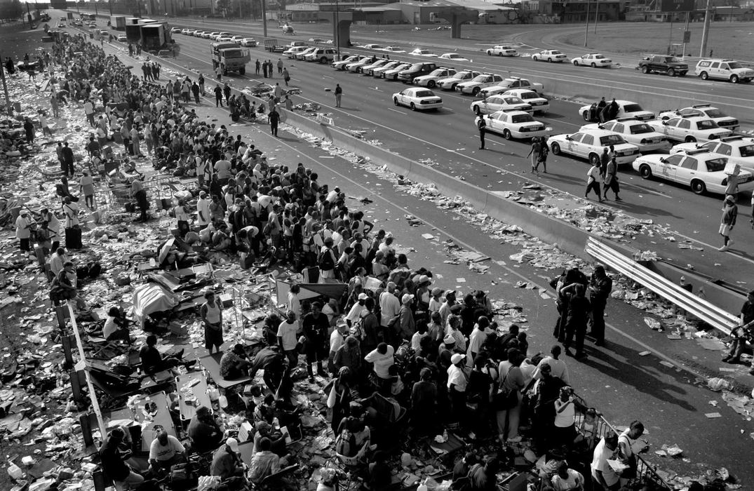 First place, News Picture Story - Dale Omori / The Plain DealerThousands of people were living near the intersection of I-10 and the Causeway awaiting evacuation out of New Orleans, Sept. 2, 2005. 