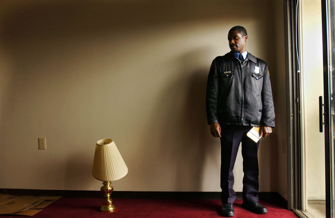 Award of Excellence, News Picture Story - Gus Chan / The Plain DealerBrandon Satchell waits patiently for movers to take everything out of an apartment in a public housing high rise.