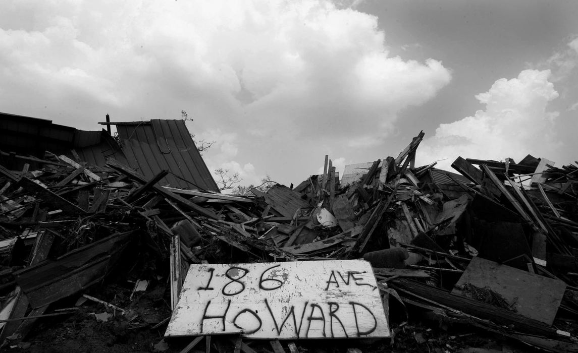 Award of Excellence, News Picture Story - Jpshua Gunter / The Plain DealerWhat once was a home is now a pile of rubble, identified only by the sign posted roadside after Hurricane Katrina in Biloxi, Mississippi, September 05, 2005. 