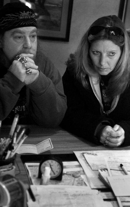 Award of Excellence, News Picture Story - Sung H. Jun / Ohio UniversityTony Mitchell and Rebecca Valentine listen carefully to Joe Whitenhead, the president of Amar Corp, at the Eastbrook Mobile Home Park office before they sign the contract for their new mobile home located in Eastbrook Mobile Home Park. 