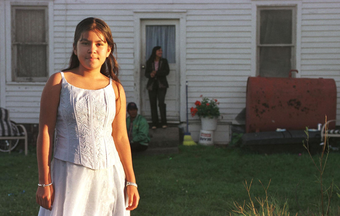 First place, James R. Gordon Ohio Understanding Award - Gary Harwood / Kent State UniversityGeorgina Soto celebrates during her 12th birthday party. The party was held in an old garage near their home. The Soto family was one of the first Latino families to become established on the Zellers Family Farm.